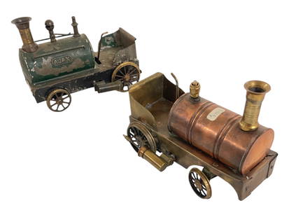 2 Stevens Dockyard Style Live Steam Locos, TLC: Unpainted example is 2 3/4" gauge, piece in whistle hole is loose; painted version is 3" gauge. Both are fixed radius with burners attached. They need TLC. SOLD AS-IS.