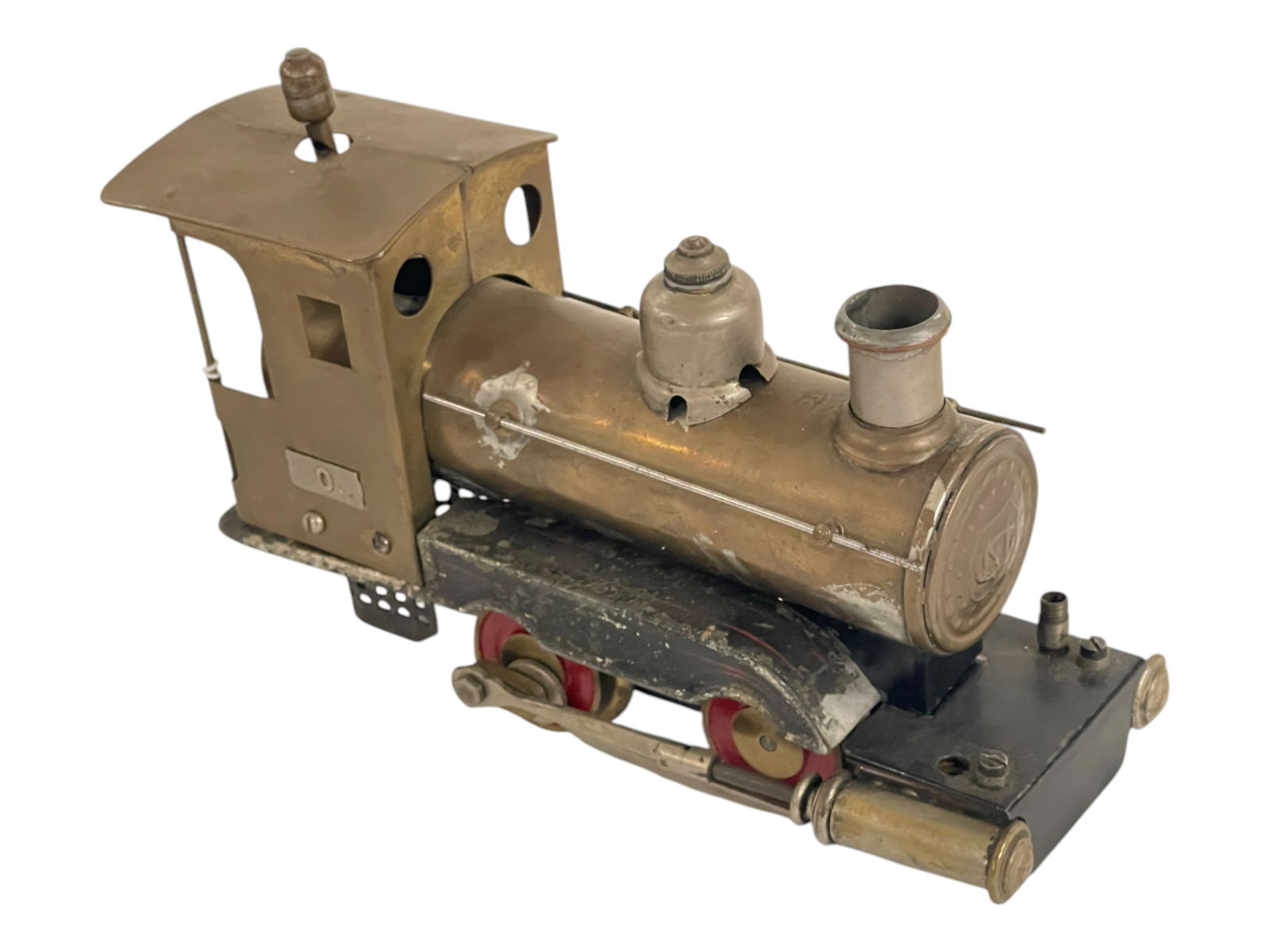 Early Marklin R.O. Live Steam Loco: Circa 1905 about O gauge. It appears to be missing some piping & burner, but most parts are present. It shows moderate use. No tender. Sold AS-IS.