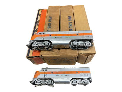 Clean Double Boxed Lionel 2355 WP F3s: 1956. Includes a 2355 WP F3 AA Diesels. Nice matched pair with clean semi-matte patina, clean silver and battery box. Nose decals show wear at door frames, and they show very light play wearwith boxes
