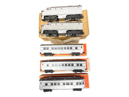Clean Boxed 1951 Lionel UP Passenger Set: Includes a 2023 UP Alco AA Diesels. Matched pair with bright silver. Battery box is clean, dummy nose decal 90%; 2-2422 Pullmans; 2423 Observation. All have very nice silver and stripes. All showlight