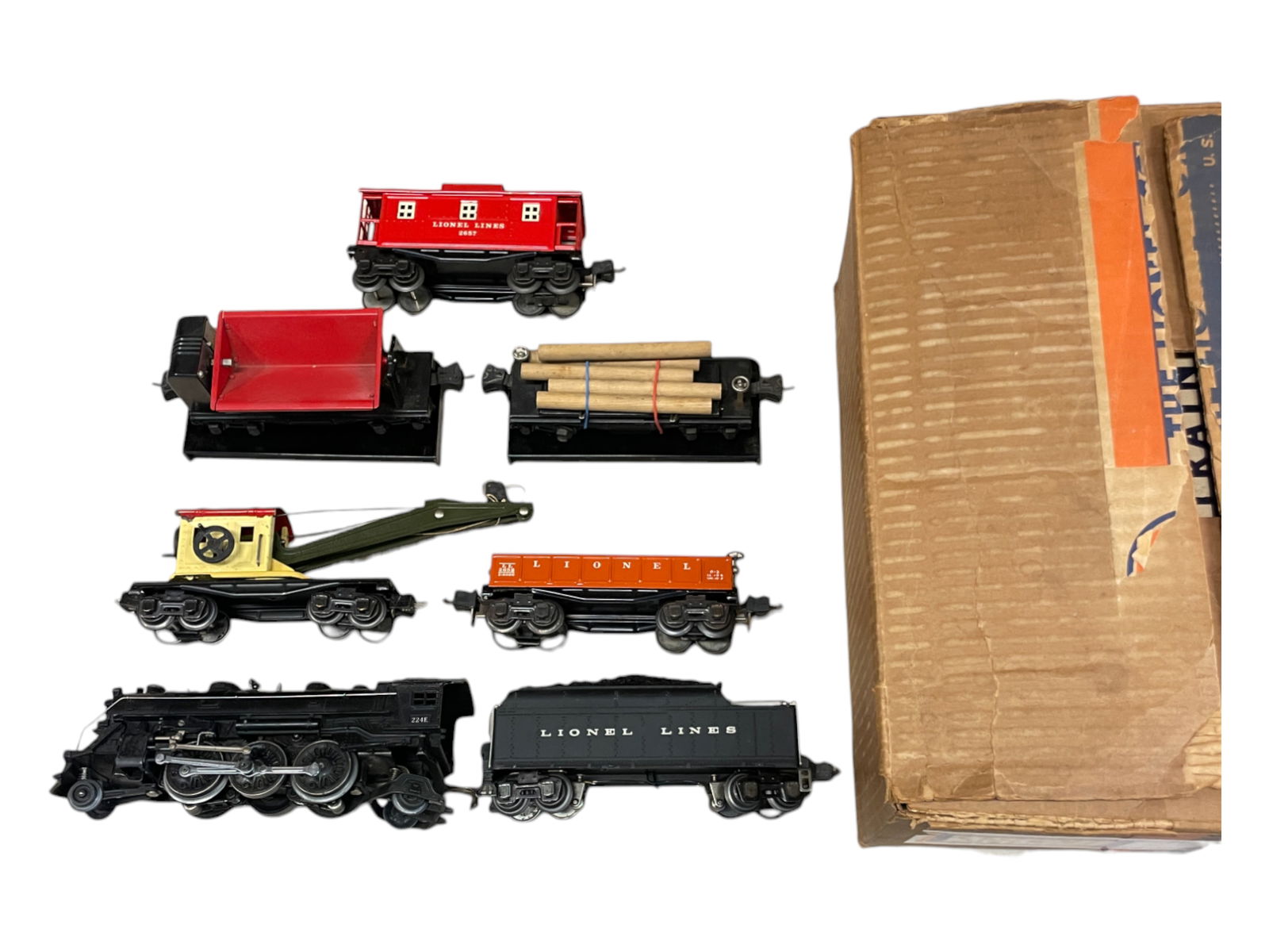 Boxed 1940 Lionel Work Train 845W: Includes a 224E Steam Loco; 2224W cast whistling tender; 2652 Gondola with 4 split drums; 3651 Log Dump with load & Bin; 3659 Coal Dump with bin; 2660 crane, late version; 2657 Caboose. All haveHBC an
