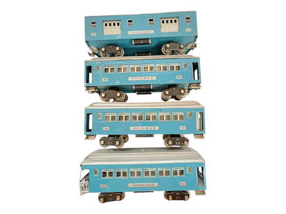4 Clean Lionel 310 Series Passenger Cars: Standard Gauge. Includes a 310 Baggage; 2-309 Pullmans; 312 Observation. All are clean with shiny bodies and nice lettering. Roofs are better than average with 1 having a small dent. They show light t