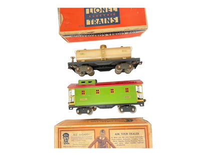 Boxed Lionel 515 & 517 Freights: Standard Gauge. Includes a 1934 Ivory 515 Tank car, worn late ob; 517 Caboose, ob. They show light play wear.