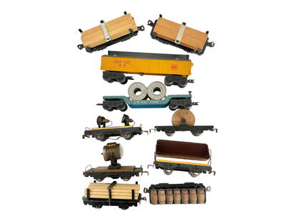 10 Assorted Pre & Postwar Marx Freights: Includes 6 pre war 4-wheel tinplate cars, searchlights show some pitting; Postwar k/c lumber cars, teal reel car and US Airforce missile launching gondola with original missile, missingcorners of fins