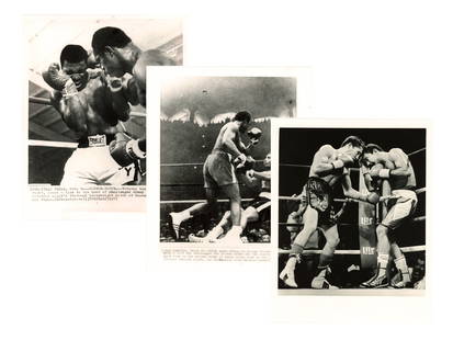 Boxing Photo Lot incl. Ali, Frazier, Foreman: Boxing photo lot featuring vintage press and wire service images of legendary fighters. Includes Joe Frazier vs. Jimmy Ellis and Muhammad Ali vs. Joe Frazier photos by United Press International, Geor