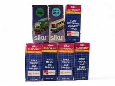 7 Boxed Siku Die Cast Trucks
