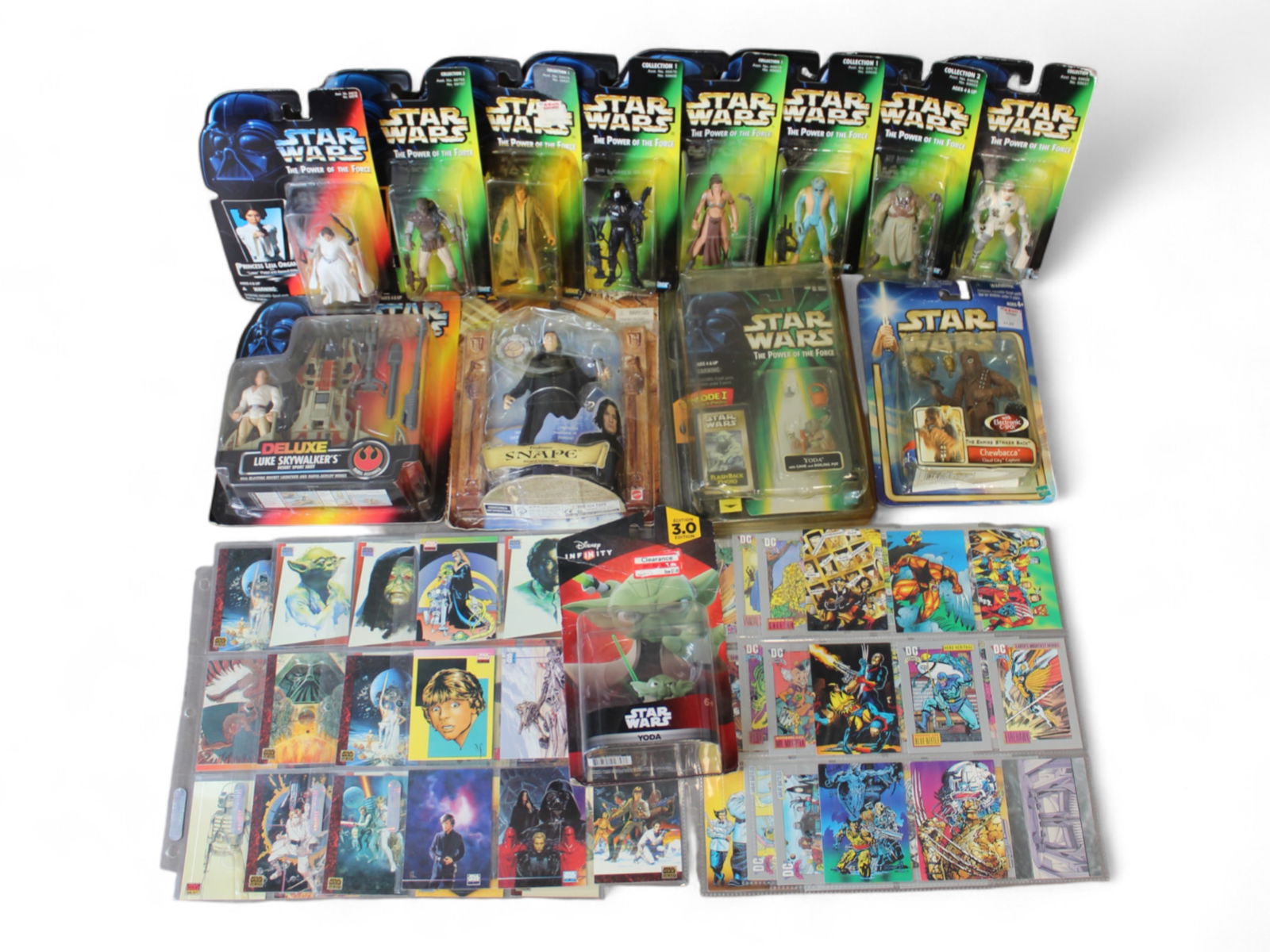 Carded Action Figure Lot, Star Wars & Others: Group of 13 carded action figures and collectibles. Includes 11 Star Wars figures from Kenner?s Power of the Force and related modern lines, Harry Potter and the Sorcerer?s Stone Professor Snape figur