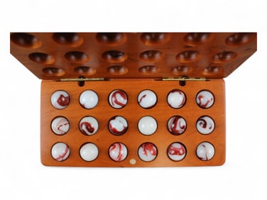 Boxed Akro Oxblood Marbles in Case