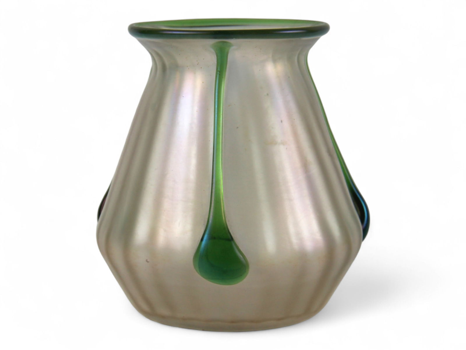 Art Nouveau Loetz Style Iridescent Glass Vase: With applied green prints, ribbed pearlized body with subtle rainbow sheen, accented by trailing green drops and rim trim. Polished pontil base. Approx. 5" high. Shipping: Weiss Auctions offers full-s