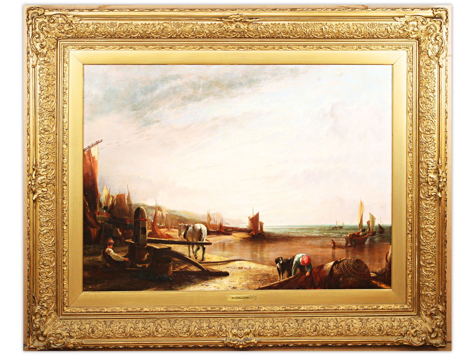 William Collins, Oil on Canvas "Coastal Scene": Offered is a very large oil on canvas painting by William Collins (United Kingdom, 1807-1846). Wonderful coastal scene with sailing ships and figures on a beach with mountains in the distance. Signed