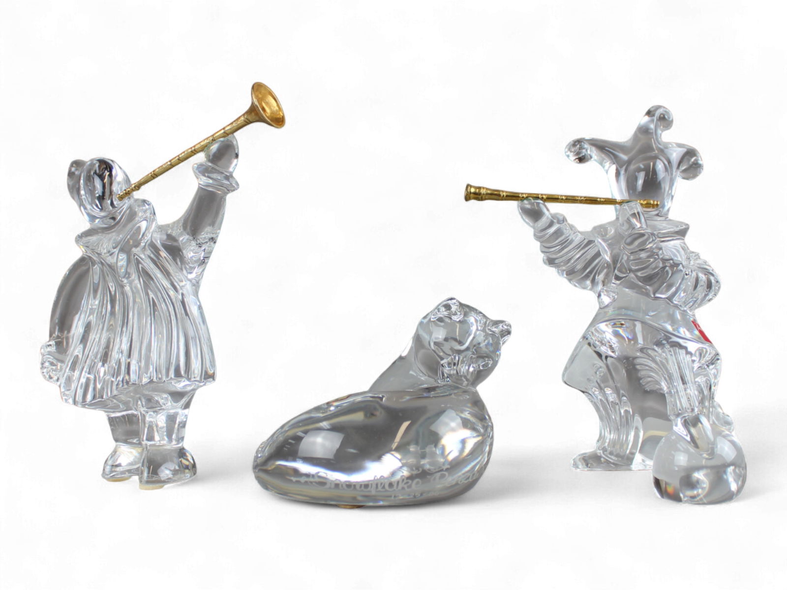 (3) Piece Baccarat Lot.: Lot includes Cat 5" across, Two Clowns with Instruments. One Horn Loose, easily reattached. Each approx. 5 1/2" tall. Shipping: Weiss Auctions offers full-service, in-house shipping for nearly all ite