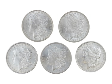(5) High Grade Morgan Dollars.