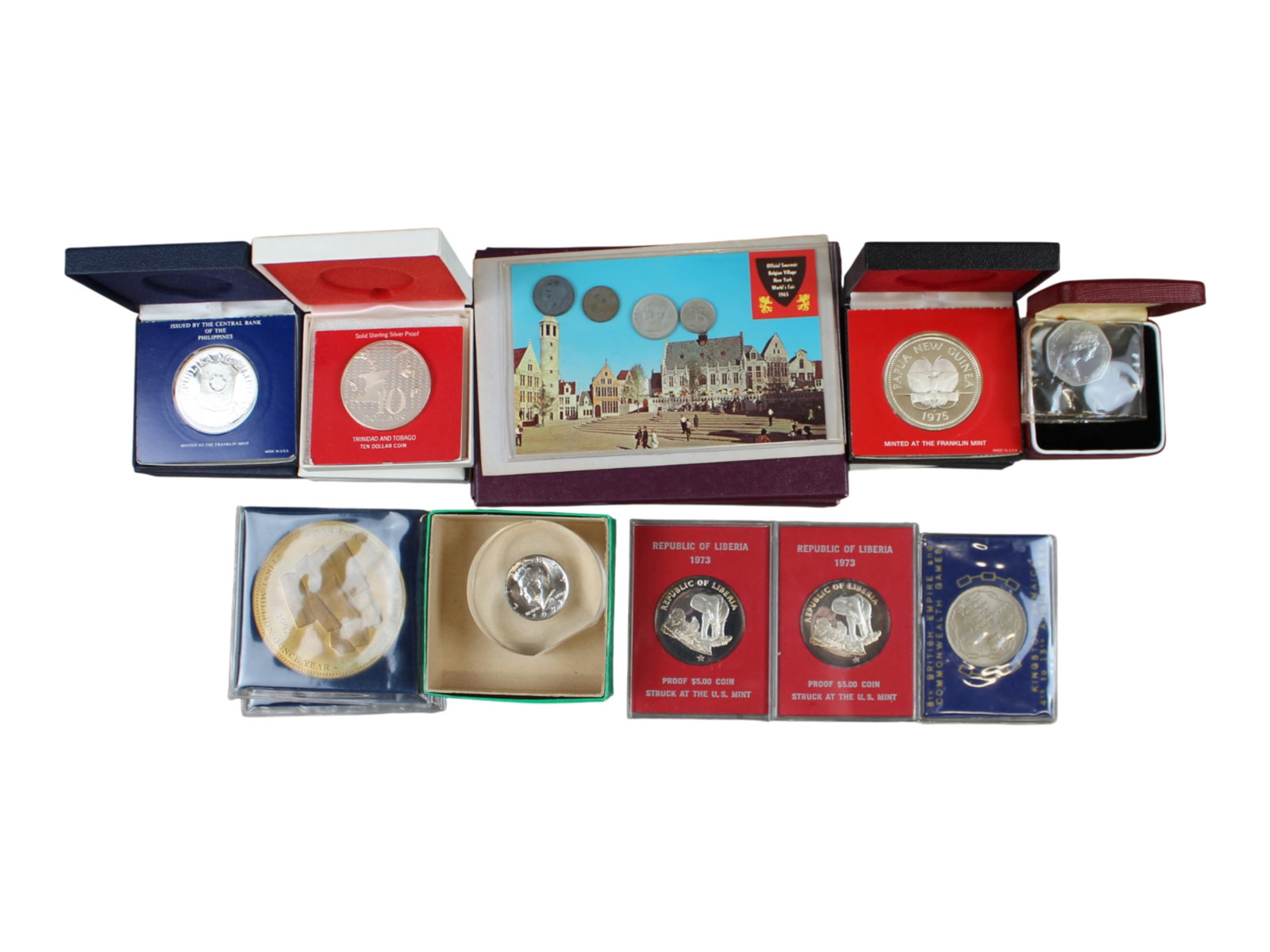 Balance of Coin Collection: Estate coin collection including two Trinidad and Tobago $10 Silver Proofs, two Liberia $5 Silver Proofs, two Papua New Guinea 20 Kina Silver Proofs, two Philippines 50 Piso Silver Proofs, three 1970 
