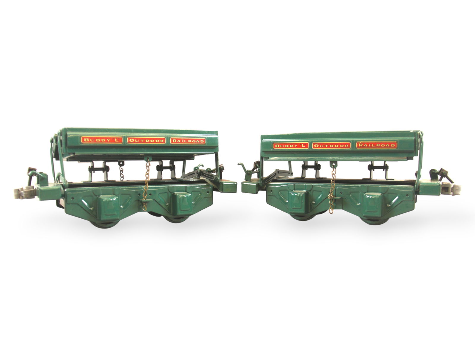 (2) Buddy L Outdoor Railroad BL-12 Side Dump Cars: Contemporary, T-Reproductions. Each approx. 12" long. Light surface wear and light paint loss spots to each. Displays well. Shipping: Weiss Auctions offers full-service, in-house shipping for nearly a