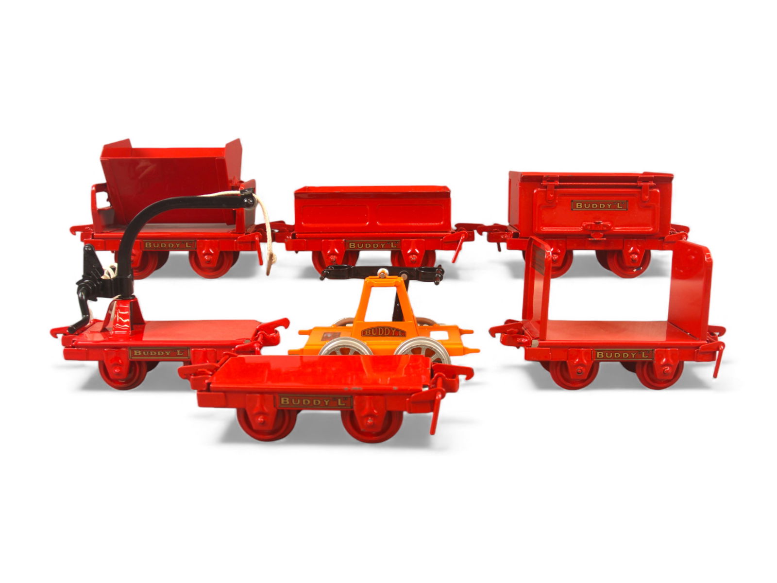 Buddy L Outdoor Railroad Industrial Cars: Contemporary, T-Reproductions. 7 pieces. Includes flat car, hopper car, gondola, hand car, and more. Light surface wear to each. Underside of hand car incised "RTW". Shipping: Weiss Auctions offers fu