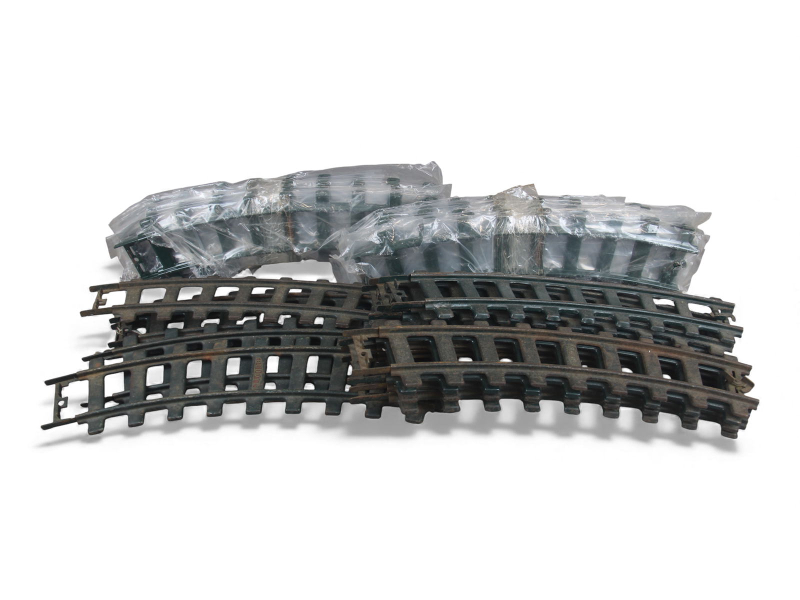 Buddy L Outdoor Railroad Industrial Track Lot: Total of 24 pieces of curved track. Includes original pieces, and some contemporary. All show some wear. Shipping: Weiss Auctions offers full-service, in-house shipping for nearly all items in this au
