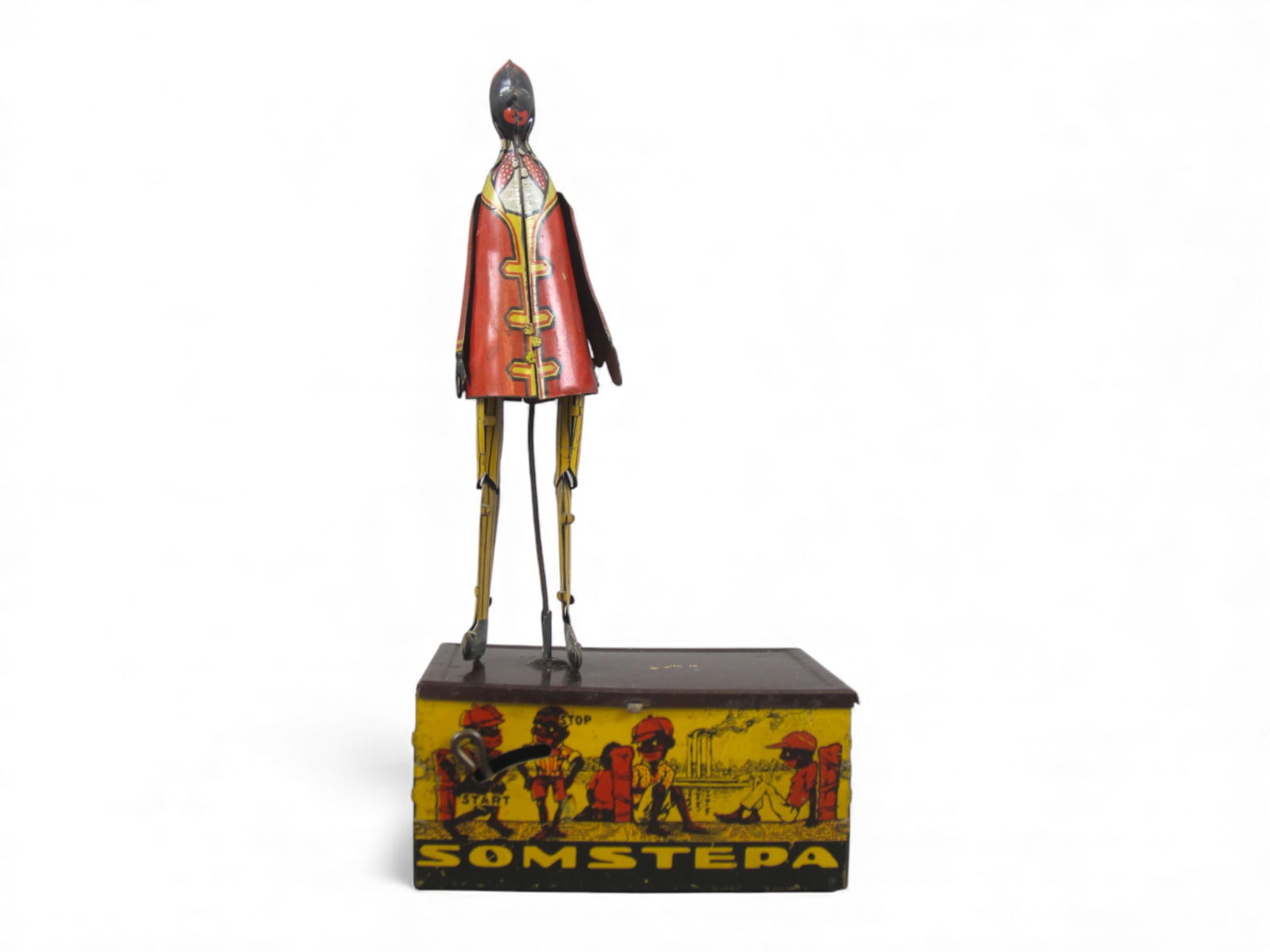 Marx Somstepa Wind-Up Toy: Louis Marx "Somstepa" tin lithographed wind-up dancing toy, circa 1930s. Stands approx. 8" tall. Classic comic-style figure in working condition when tested. From the Charles Atchison Collection. 