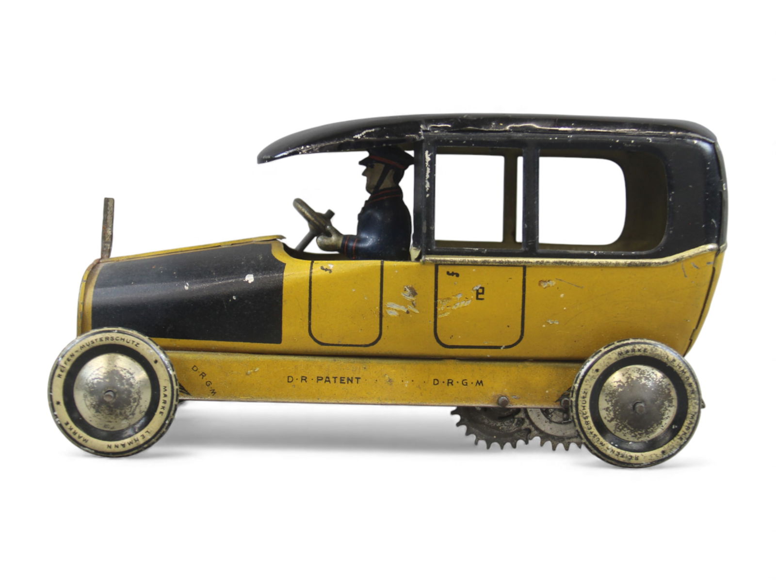 Lehmann No. 754 Sedan Toy: German Lehmann No. 754 tin lithographed sedan, measuring approx. 7" long. Displays nicely with clean surfaces and nice lithography. Working condition when tested. From the Charles Atchison