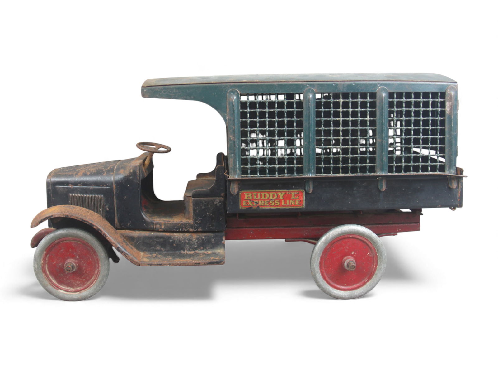 Buddy L Railway Express Line Cage Truck: Buddy L Express Line pressed steel truck featuring a black open cab, removable green steel cage body, (2) opening rear doors, and a functioning fold down tailgate. Rear doors are slightly