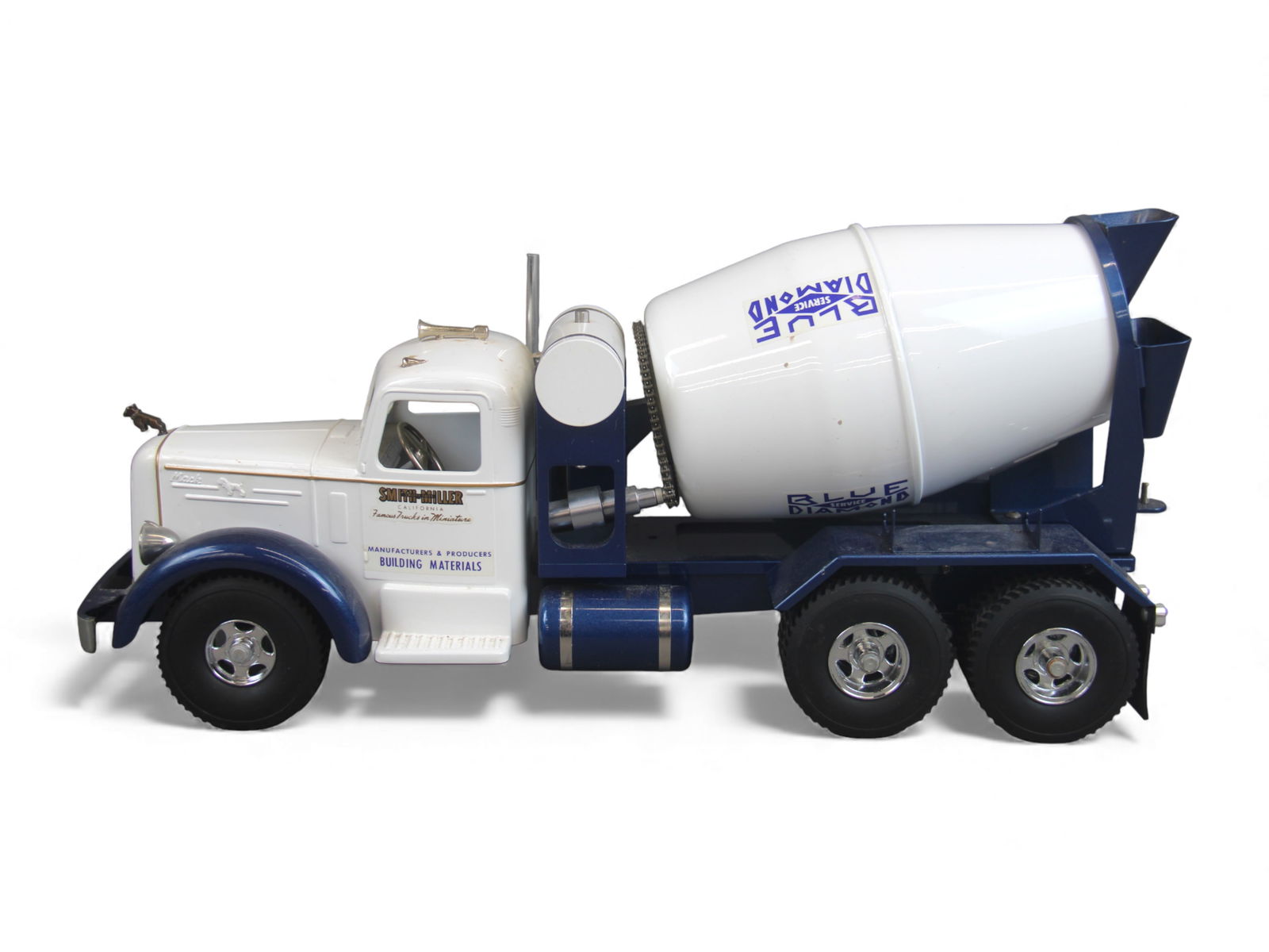 Smith Miller Blue Diamond Cement Mixer Truck: Fred Thompson Smith Miller pressed steel "Blue Diamond" Cement Mixer Truck, featuring blue and white paint, detailed Mack-style cab, chrome exhaust stack, dual rear axles, and large rotating mixer