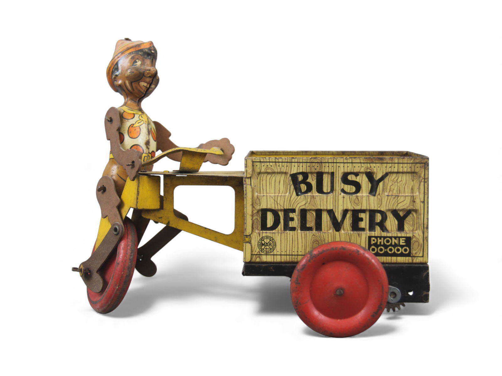 Marx Busy Delivery Wind-Up Toy: Marx tin lithographed "Busy Delivery" wind-up toy featuring Pinocchio as the driver. Measures approx. 9?" long. Original example showing some wear and could benefit from a light cleaning. Overall good