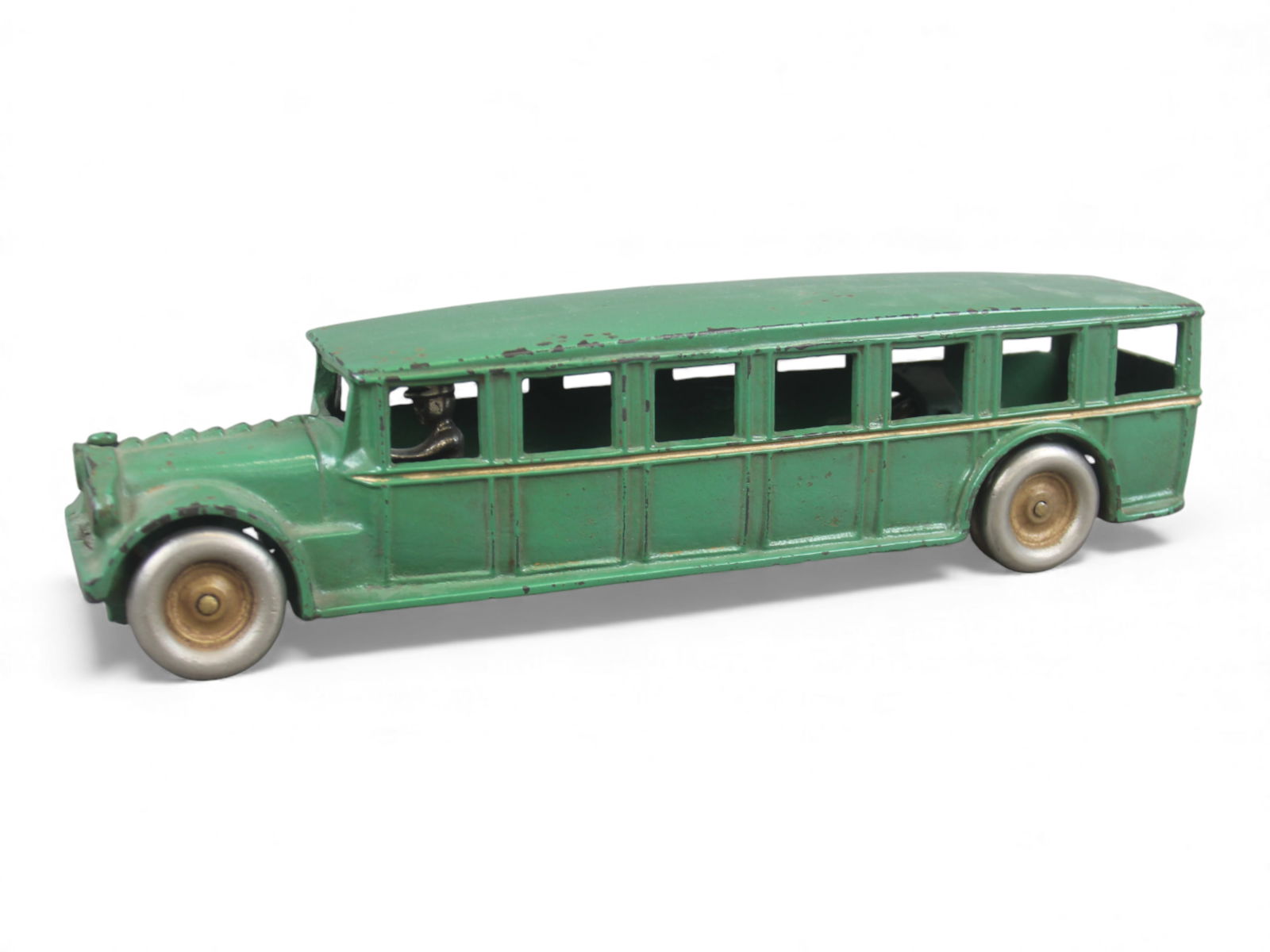 Arcade Fageol Safety Coach Bus: Arcade cast iron Fageol "Safety Coach" bus, approx. 12?" long. Original green paint in excellent condition. Newer screw holding driver in place, easily removed. Shipping: Weiss Auctions offers