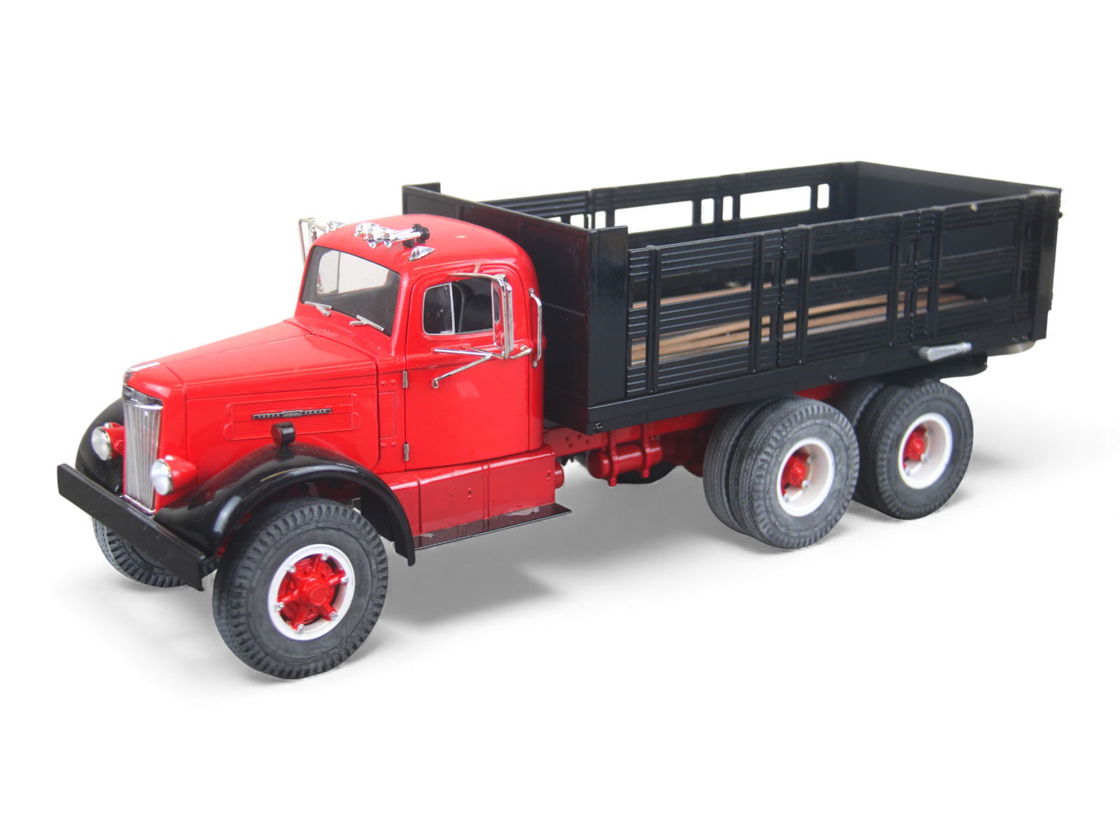 Fumby White WC-22 Super Power Stake Truck: Nice modern production, painted cast & pressed steel with rubber tires, 19" long. Has a functional rear lift gate, opening cab doors & hood with nice interior & motor details. Has wood-grain stickers
