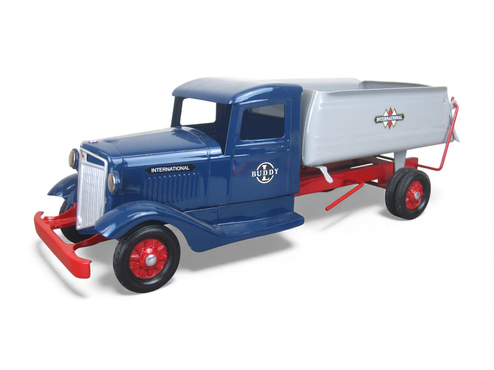 Custom Buddy L International Express Dump Truck: Modern Production, painted pressed steel. 24" long. It shows light handling. Shipping: Weiss Auctions offers full-service, in-house shipping for nearly all items in this auction. For a shipping quote,