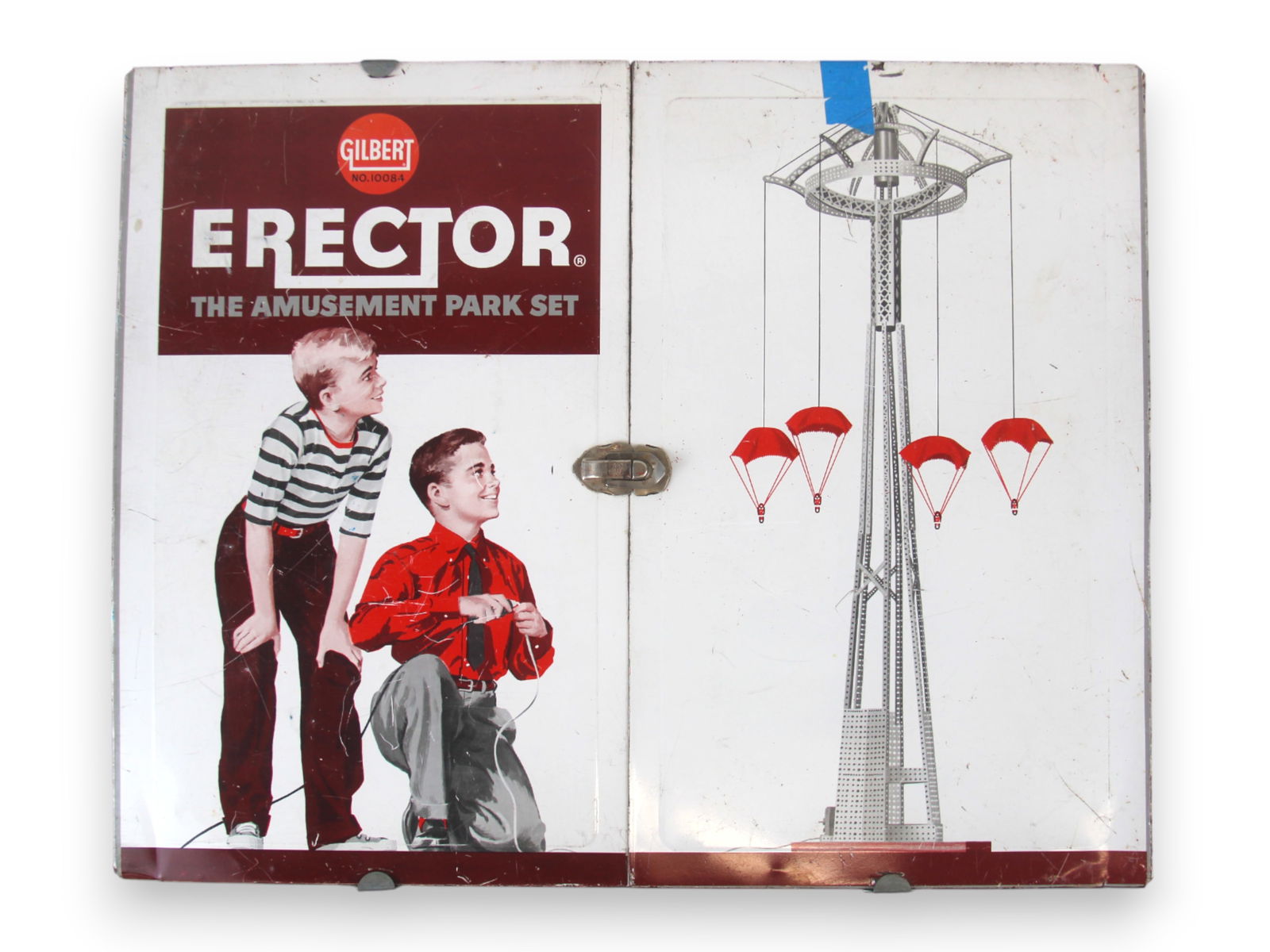 Boxed A.C. Gilbert #10094 & 10084 Erector Sets: Pair of vintage A.C. Gilbert Erector Sets including a No. 10094 (12-1/2) "Master Builder's Set" and a No. 10084 (10-1/2) "Amusement Park Set," each housed in its original illustrated metal case with