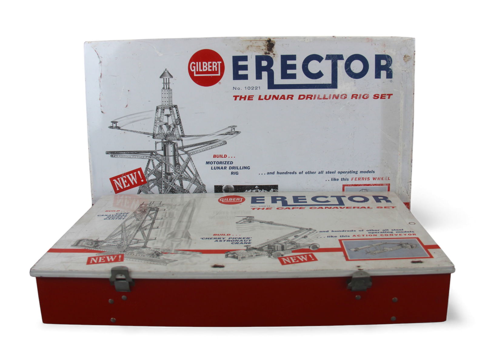 Pair of A.C. Gilbert Erector Space-Era Sets: Pair of vintage A.C. Gilbert Erector Sets from the early 1960s, including the No. 10211 "Cape Canaveral Set" and the No. 10221 "Lunar Drilling Rig Set." Each is housed in its original metal case with
