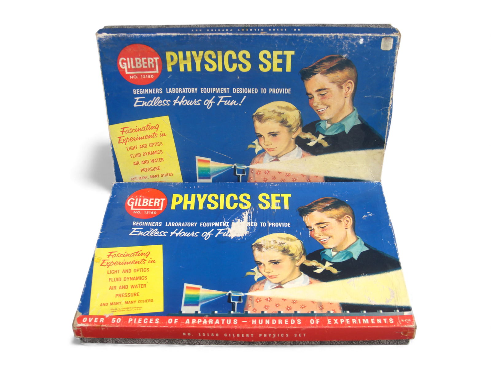 (2) Boxed Gilbert Physics Sets No. 15180: Pair of vintage Gilbert Physics Set No. 15180 kits, each featuring beginner-level laboratory equipment designed for experiments in light and optics, fluid dynamics, pressure, air and water, and