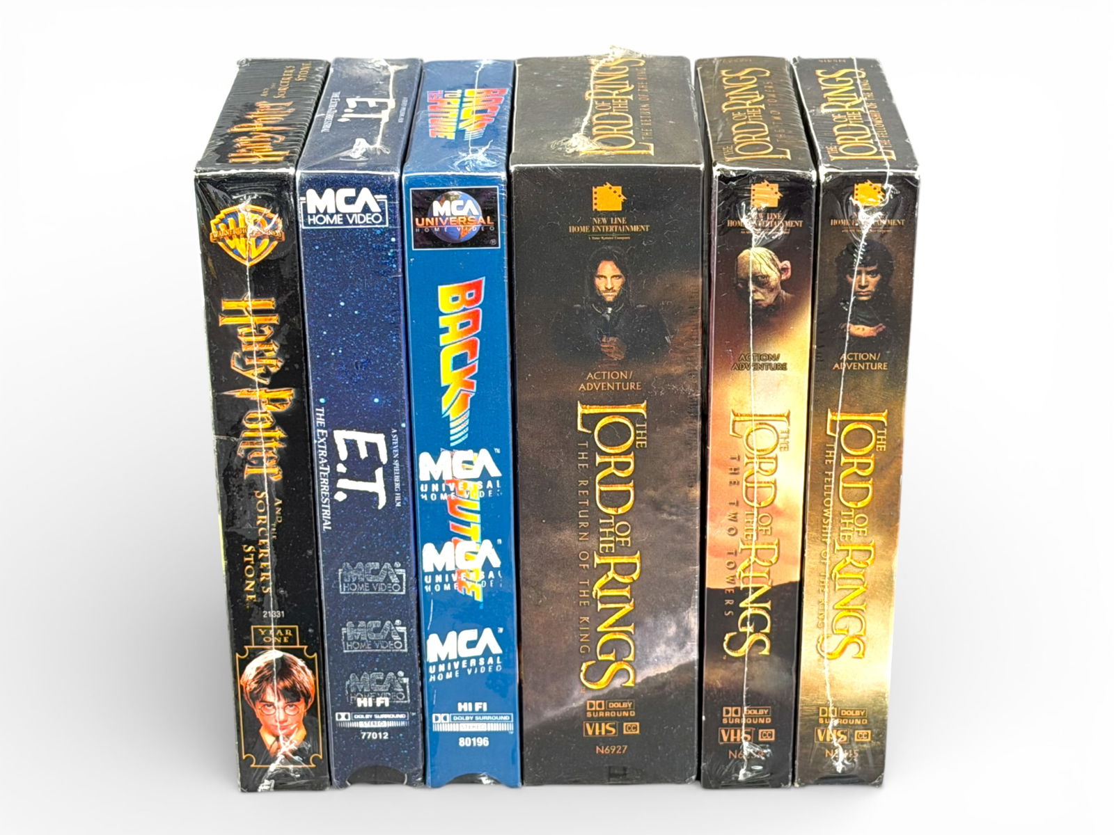 (6) Sealed VHS: Back to Future, Potter, LOTR: Lot of six sealed VHS movies including Back to the Future, E.T. The Extra-Terrestrial, Harry Potter and the Sorcerer's Stone, and all three Lord of the Rings titles?The Fellowship of the Ring, The