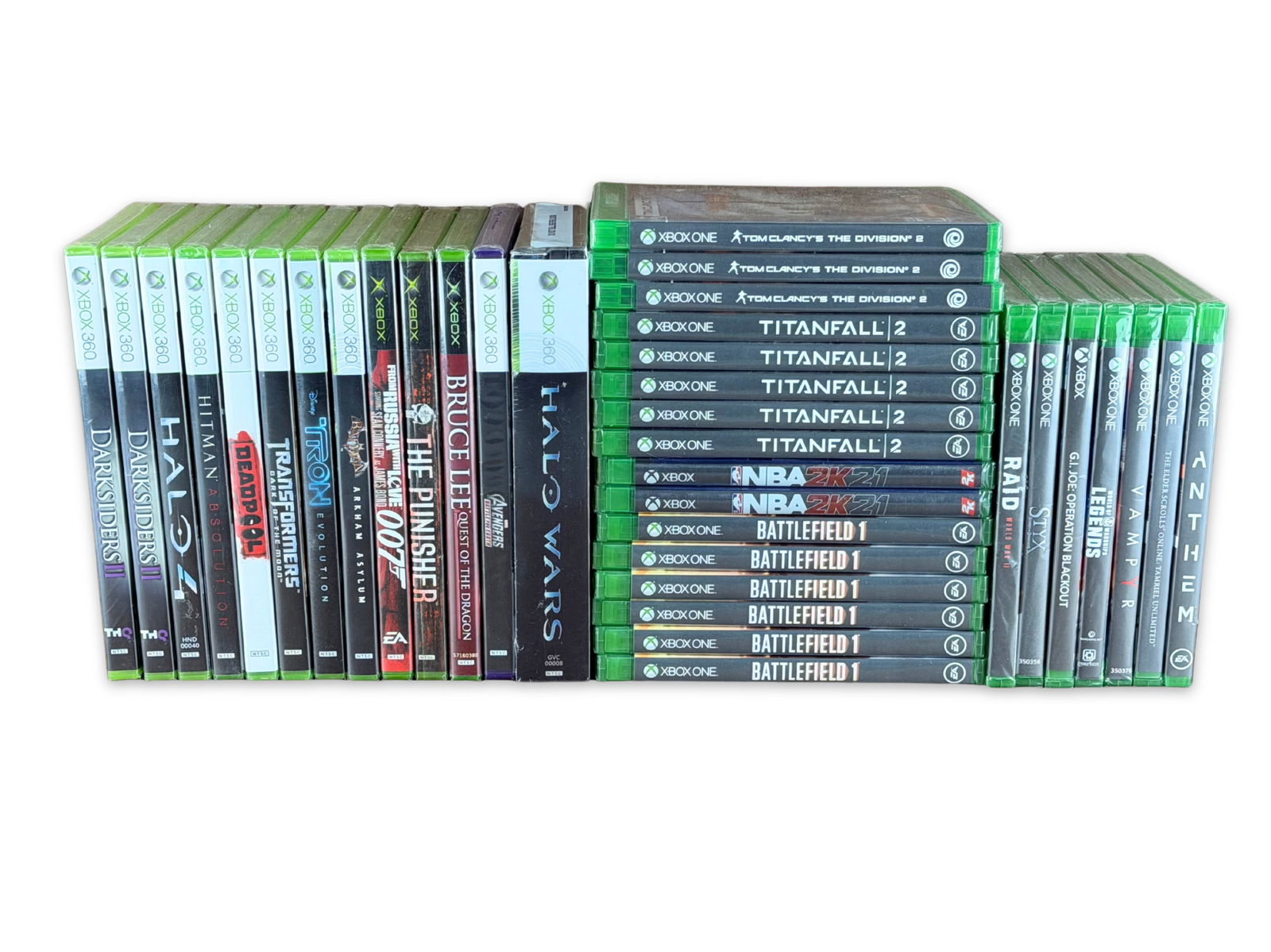 (36) Sealed Xbox Games - Mixed Systems: Large lot of thirty-six sealed video games for Original Xbox, Xbox 360, and Xbox One systems. Includes titles such as Deadpool, The Punisher, Batman: Arkham Asylum, Darksiders I & II, Halo Wars - Limi
