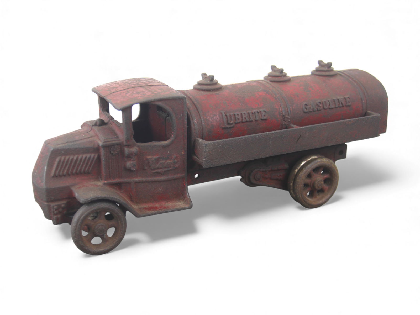 Arcade 33 Lubrite Gasoline Truck: Painted cast iron with metal wheels 12 1/2" long. Its intact, all original with about 35% paint left. A good clean and polish may brighten what is here. Shipping: Weiss Auctions offers full-service, i