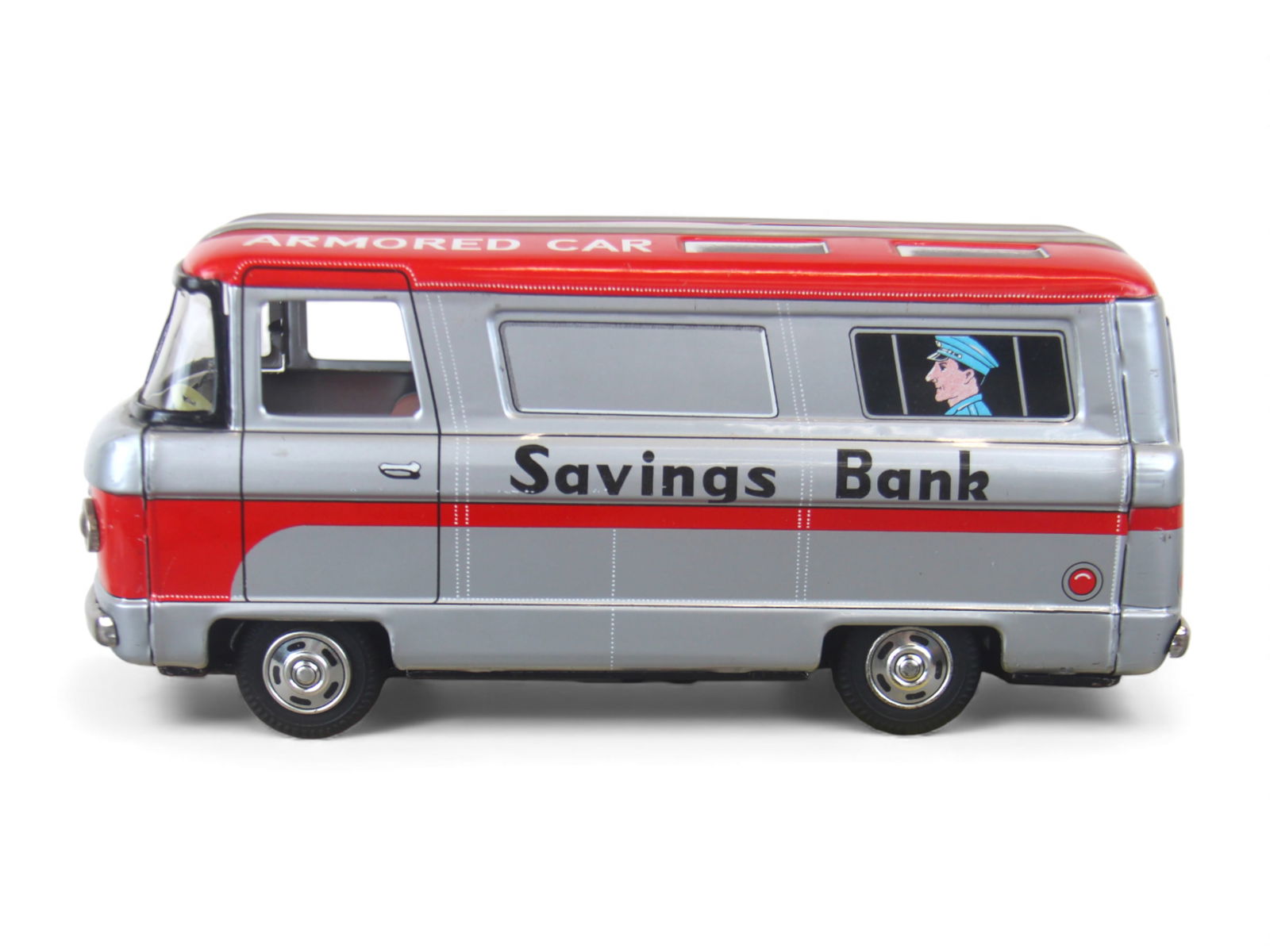 Boxed Hitachi, Japan Armored Car: Nice example litho tin with rubber tires, 10" long. Friction works well and has key for trap. When door is unlocked a bell sounds in alarm. It is NMint with better than average box. Shipping: Weiss