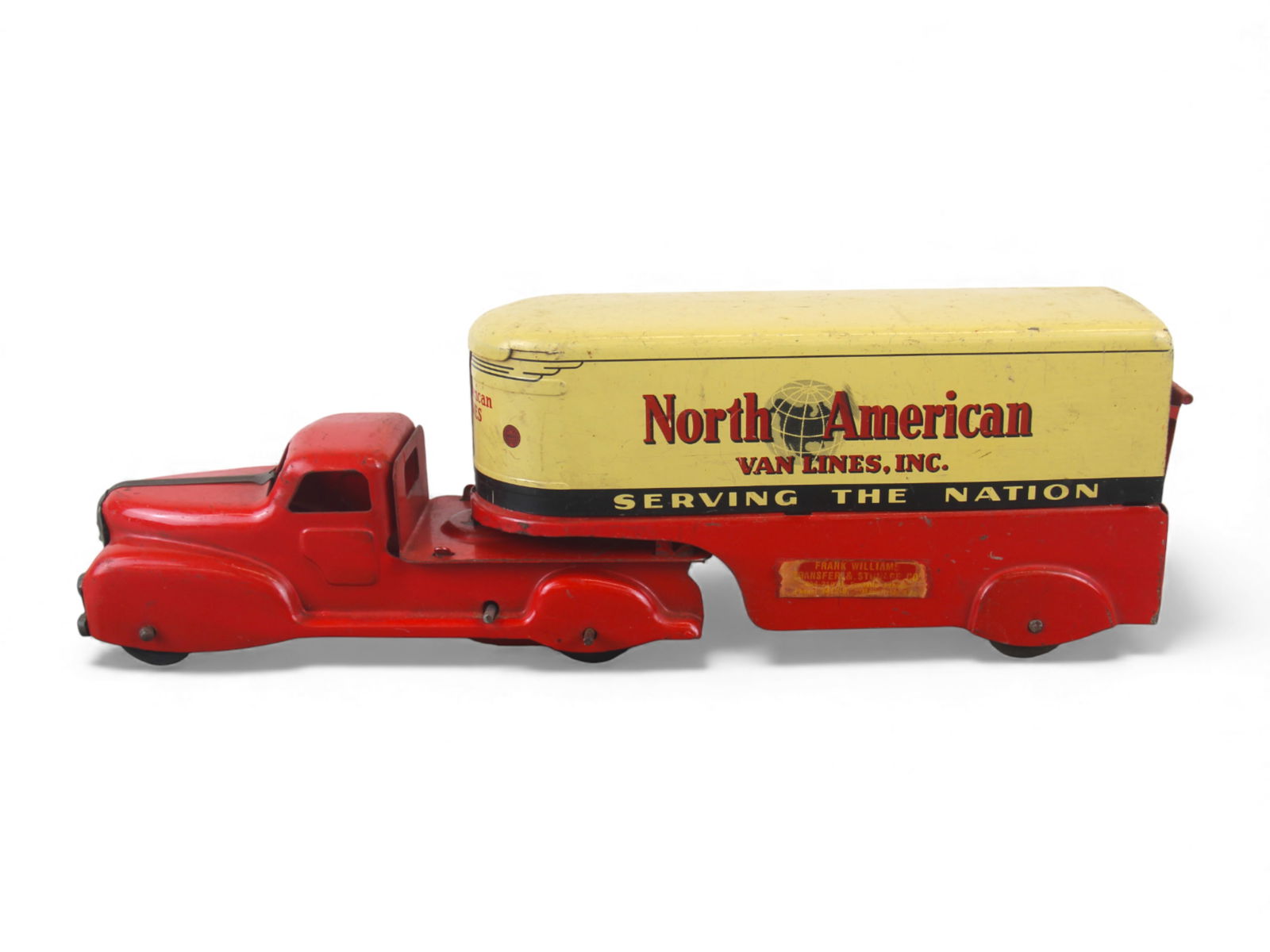 Marx North American Van Lines: Enamel and lithographed pressed steel, with rubber tires, 14" long. It has a wind-up mechanism with place and start action, that isn't functional. It retains its rear door & has a private label sticke