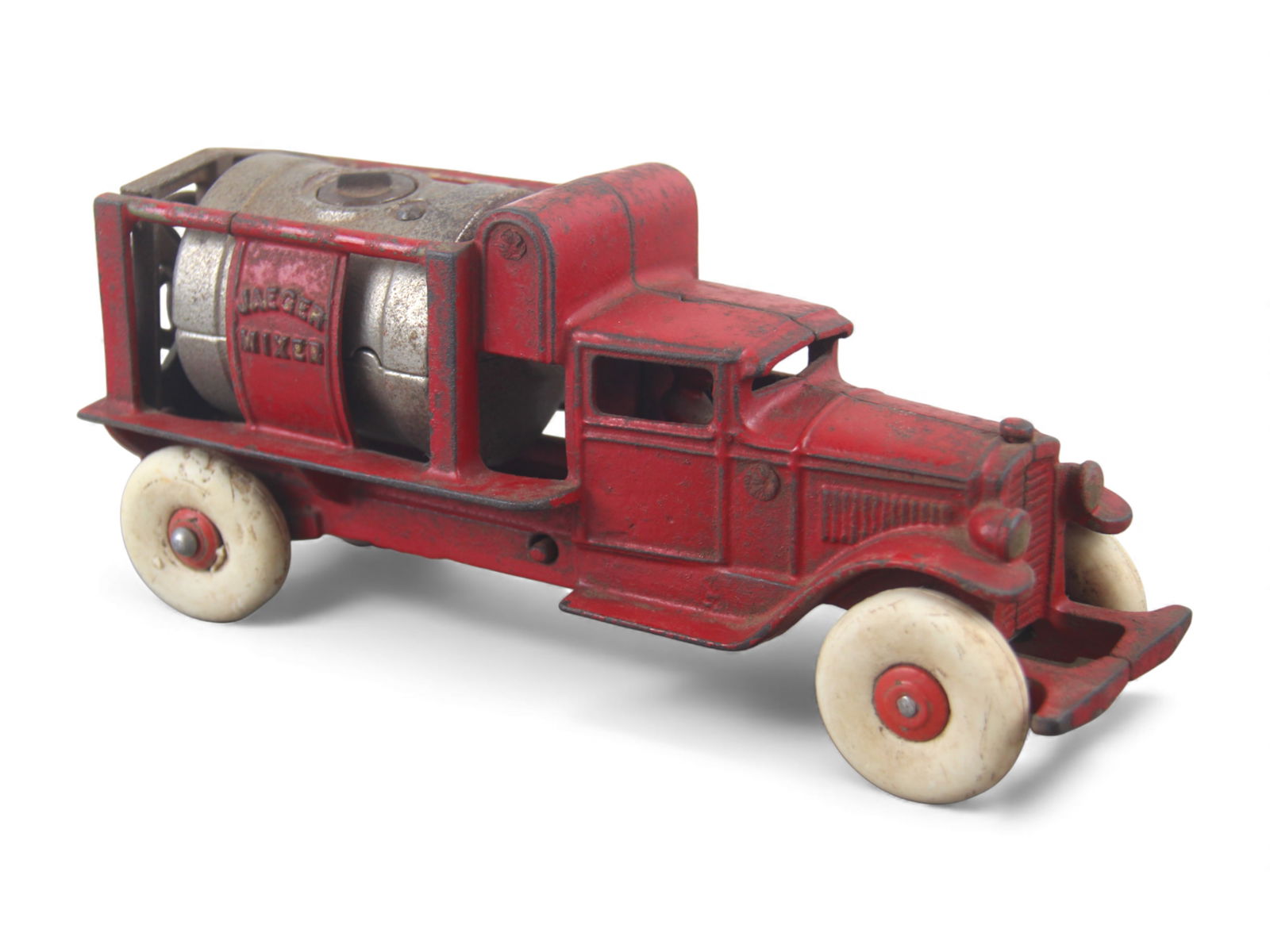 Kenton Jaegar Cement Mixer: Painted cast iron 6 1/2" Long. Has 90% paint with original rope. It would benefit from a cleaning and shows light to moderate play wear. Shipping: Weiss Auctions offers full-service, in-house