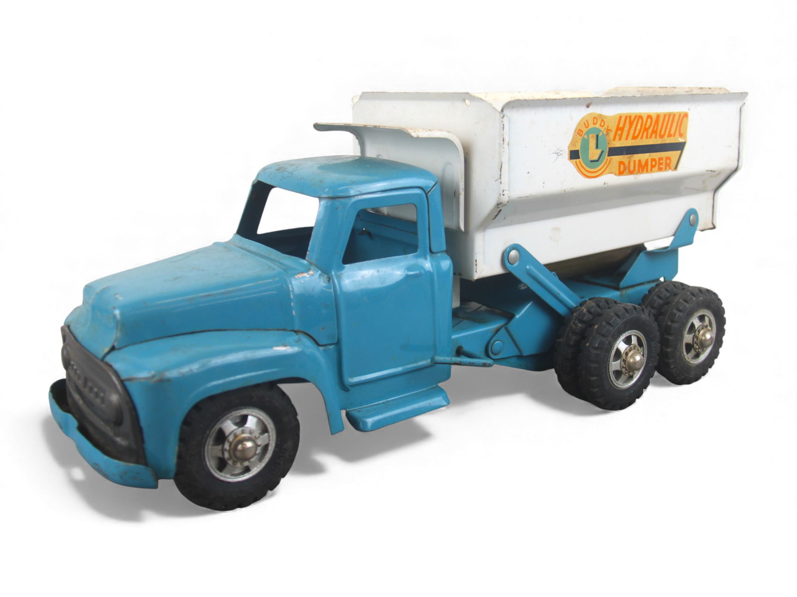 Deluxe Buddy L Hydraulic Dump Truck: Large size painted pressed steel truck with rubber tires, 20" long. The hydraulic piston functions as intended with slow lift motion. The decals are 95%, homemade rear slide door. It shows light play