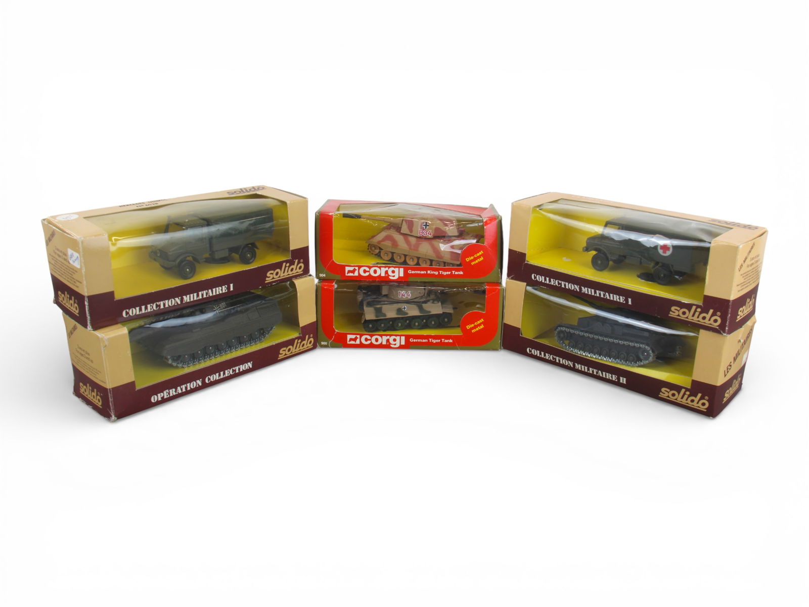 Solido and Corgi Boxed Military Vehicles: 6 Boxed modern Corgi and Solido military vehicles, Some wear and cello window separation. Shipping: Weiss Auctions offers full-service, in-house shipping for nearly all items in this auction. For a