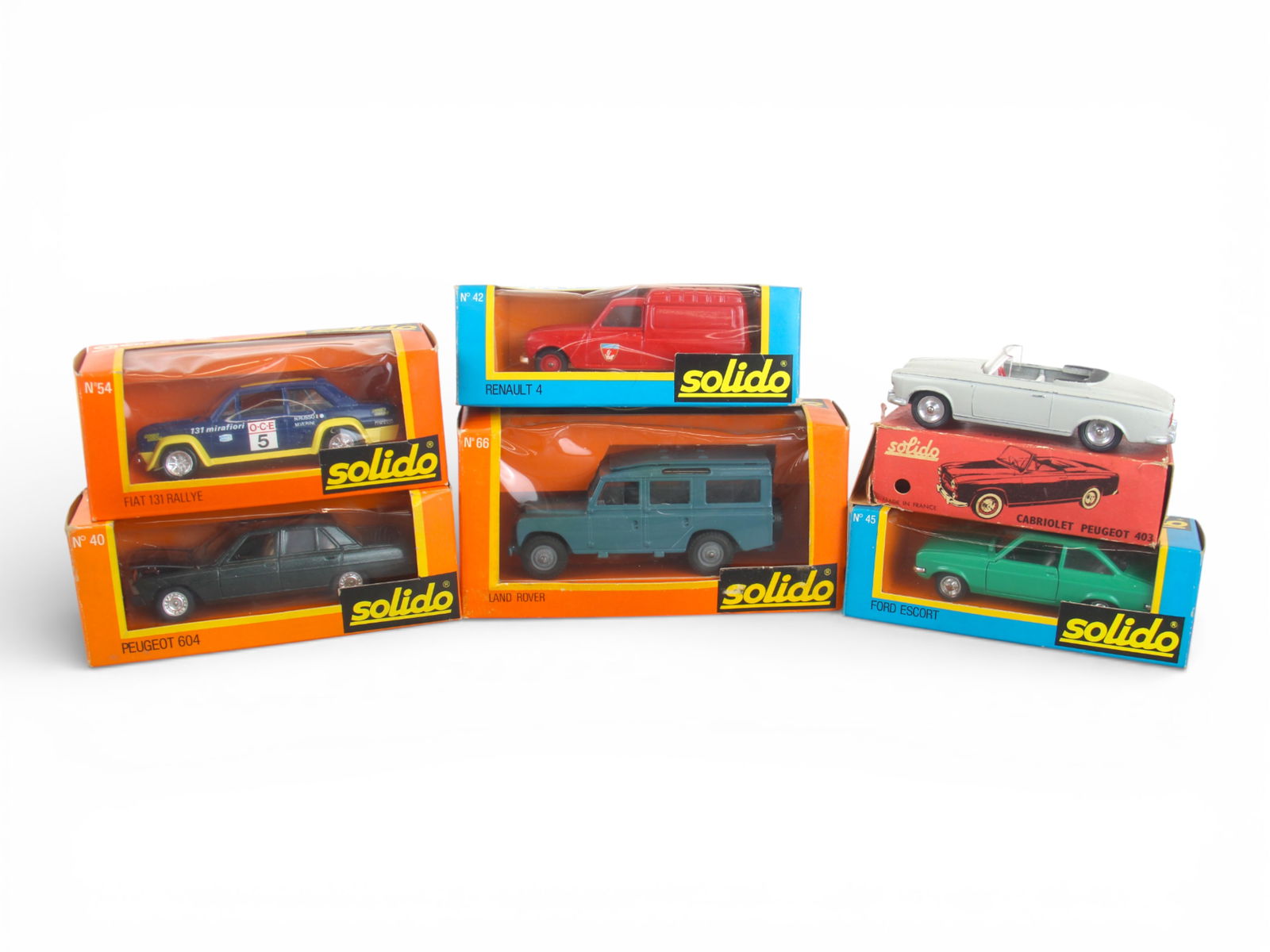 Boxed Solido Diecast Vehicles: Six boxed vintage Solido diecast vehicles including Cabriolet Peugeot 403 and Nos. 40, 42, 45, 54, and 66. Light wear; some boxes with cello window separation. Shipping: Weiss Auctions offers