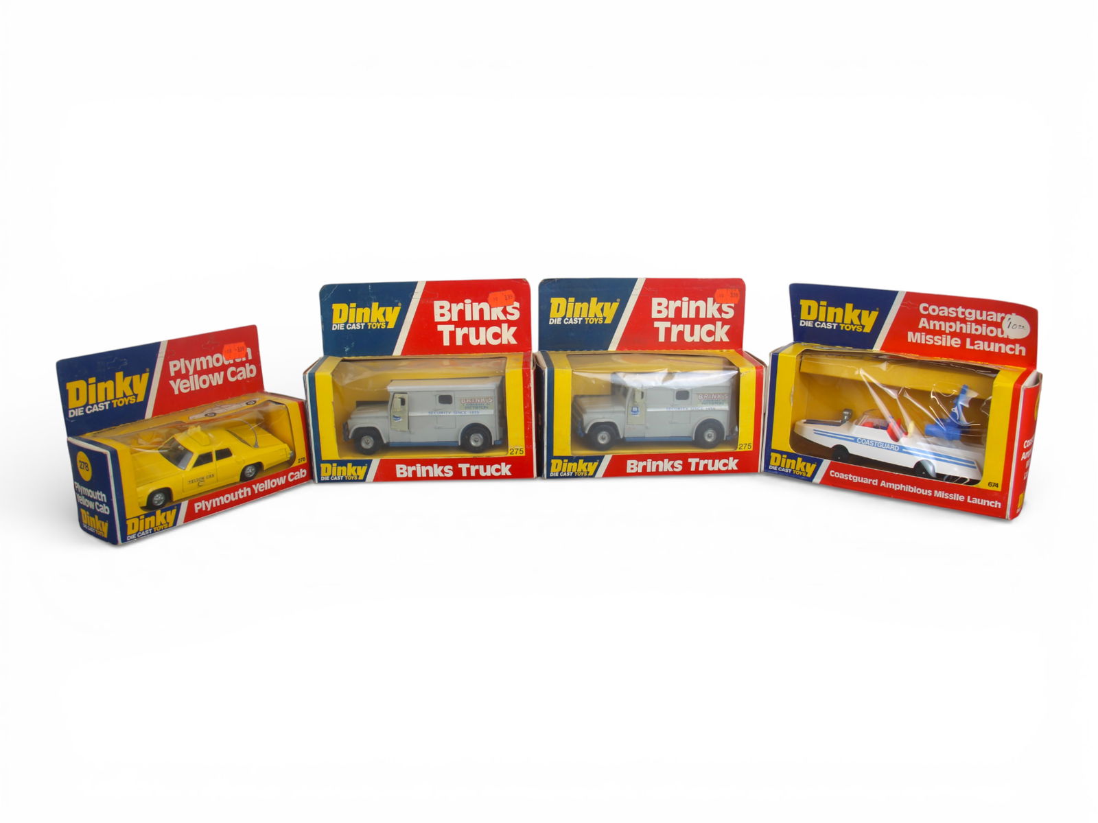 Boxed Dinky Diecast Vehicles: 4 boxed Dinky Toys diecast vehicles including two No. 275, No. 278 and No. 674. Some wear and some cello window separation. Shipping: Weiss Auctions offers full-service, in-house shipping for nearly