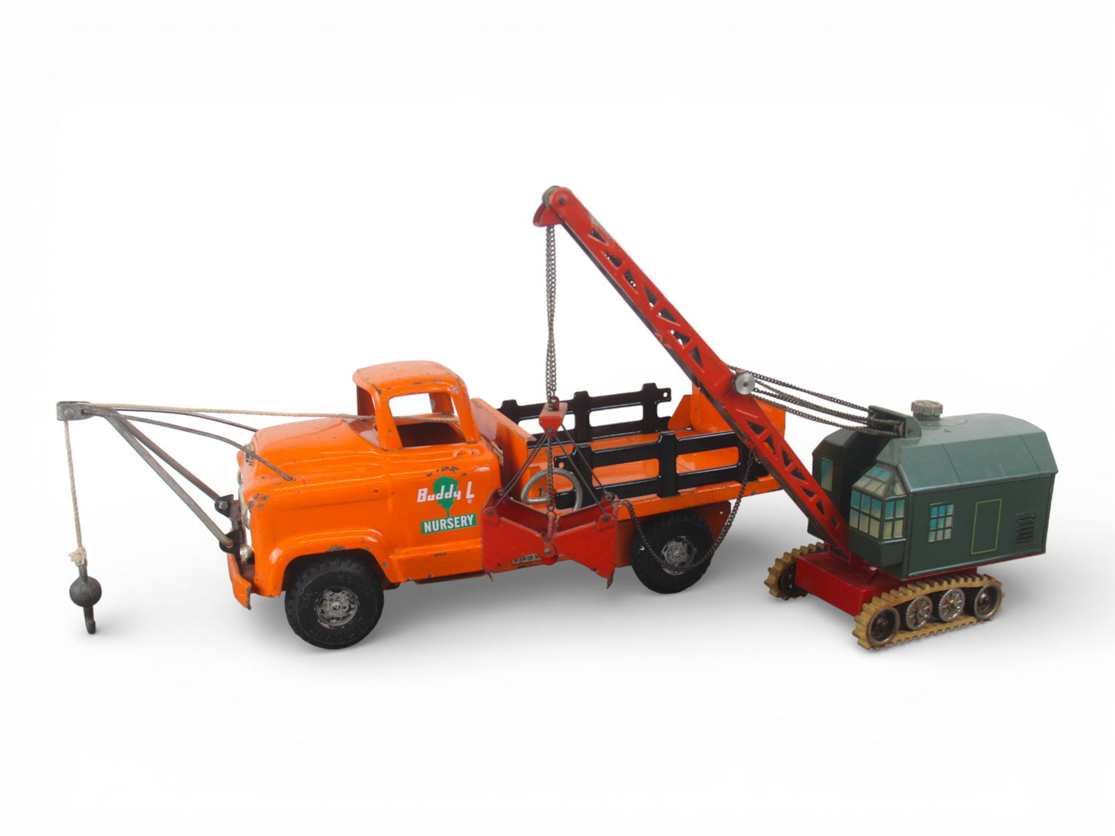 Buddy L & Biller Toy Vehicles: Includes a Biller, W. Germany Steam clamshell crane. Has a functional wind-up mechanism with integral key, 2/3 functions work, shows very light use; Buddy L Nursery Truck, 18" long with plastic tires