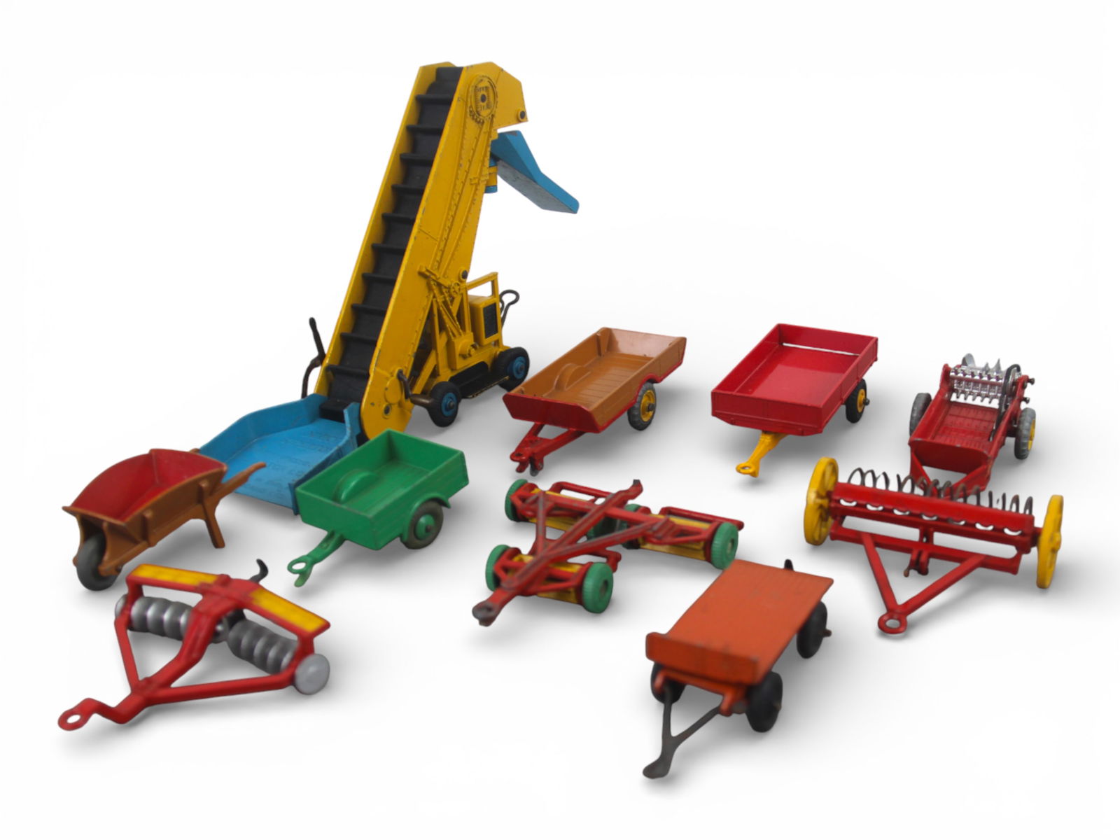 Dinky Farm Vehicles & Accessories: Ten Dinky diecast farm vehicles and accessories. Shipping: Weiss Auctions offers full-service, in-house shipping for nearly all items in this auction. For a shipping quote, please contact us prior