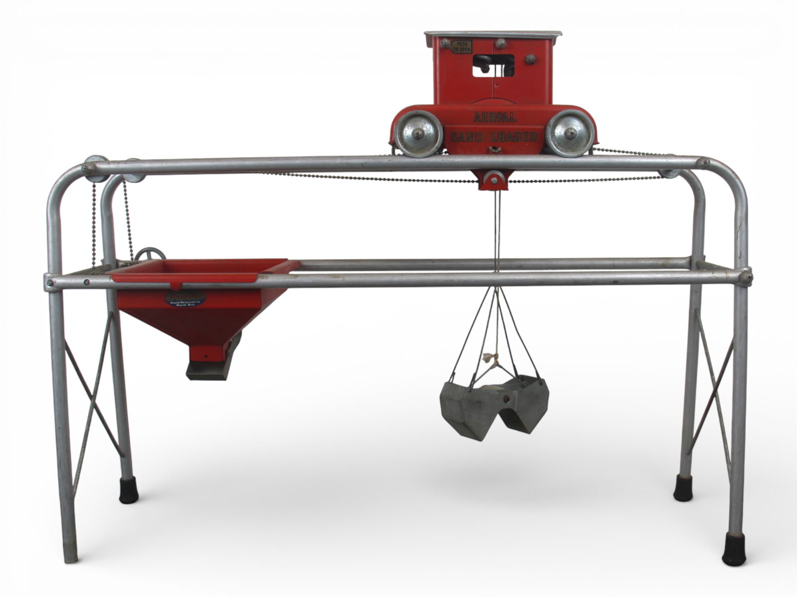 Nice 1956 Tonka Aerial Sand Loader: It is complete, with nice decals and would benefit from a cleaning, missing 1 rubber foot, 25" wide. It shows light play wear. Shipping: Weiss Auctions offers full-service, in-house shipping for