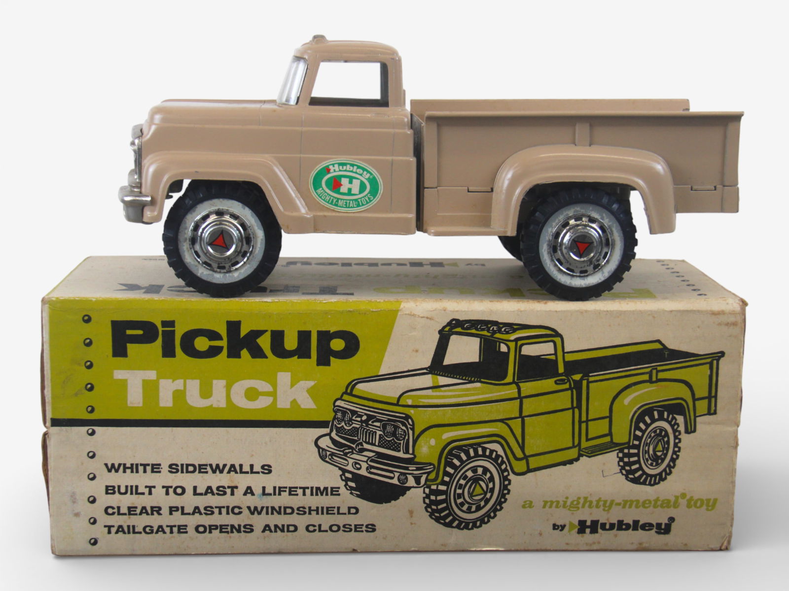 LN Boxed Hubley 882 Pick-up: Super example with the only flaw being white wall stickers are lifting a bit. It shows light handling, 3 inner flaps coming loose one side. Shipping: Weiss Auctions offers full-service, in-house