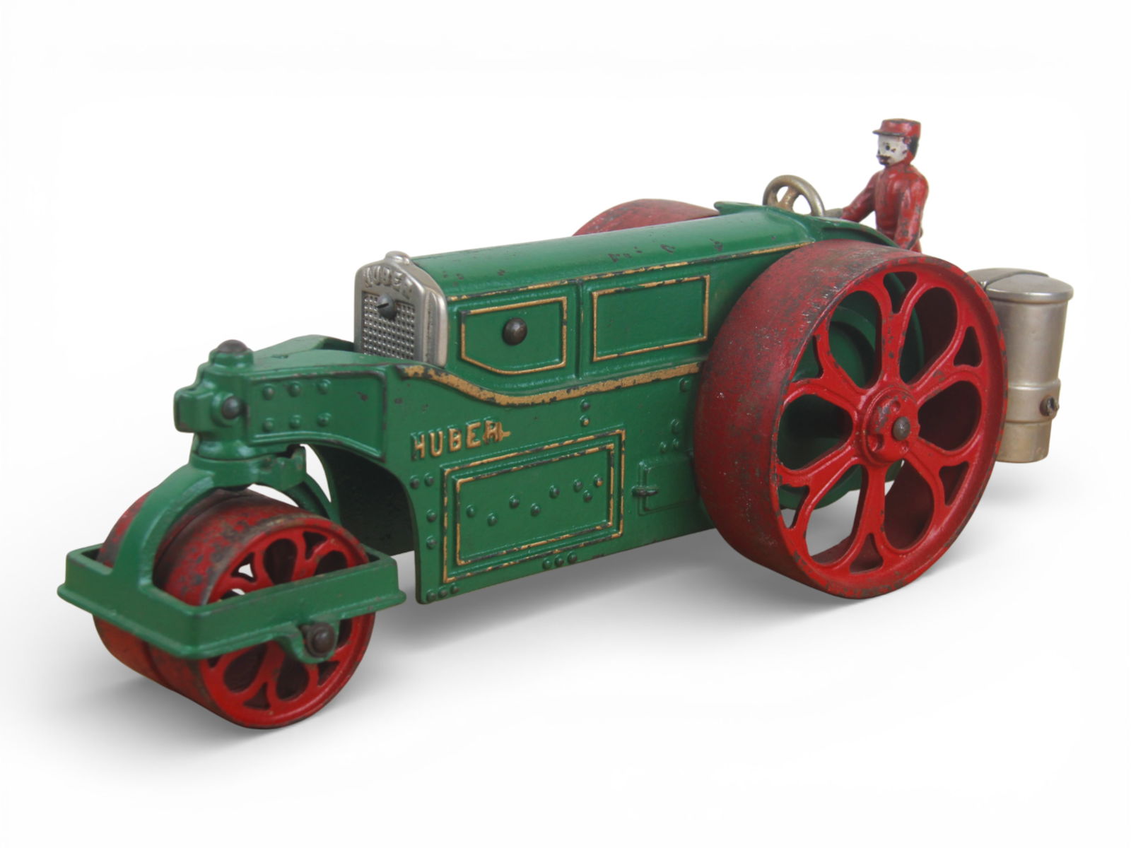 Large Hubley Cast Iron Huber Road Roller: Painted cast iron, with nickel trim, 15:" long. It is the vertical tank variation with its original driver. It is missing the nickel spreader rake in back. It shows light to moderate play wear, Nice