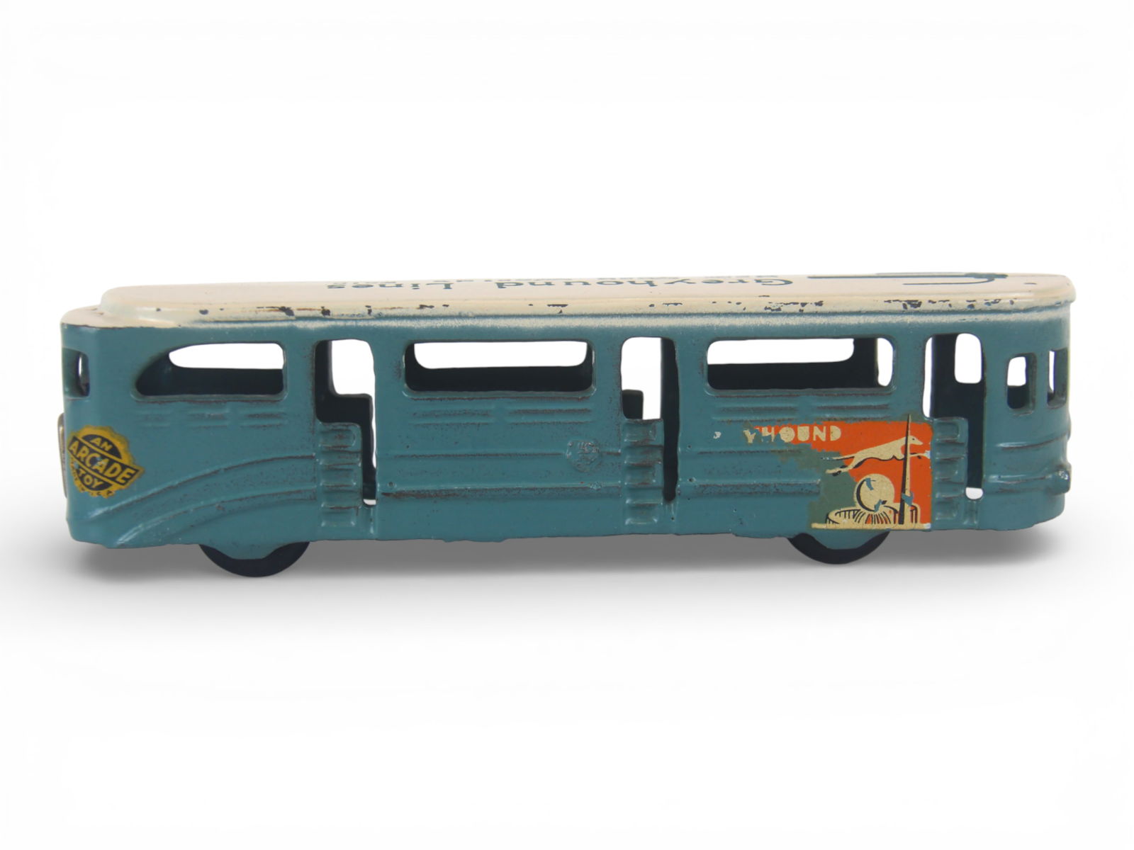 Super Arcade Worlds Fair Tram: Painted and decaled cast iron, 7" long. It is very clean with 94% decals. It shows very light play wear. Nice Example!From the Gary Slutzky Collection of Pressed Steel, Tin, and Cast Iron Vehicles. 