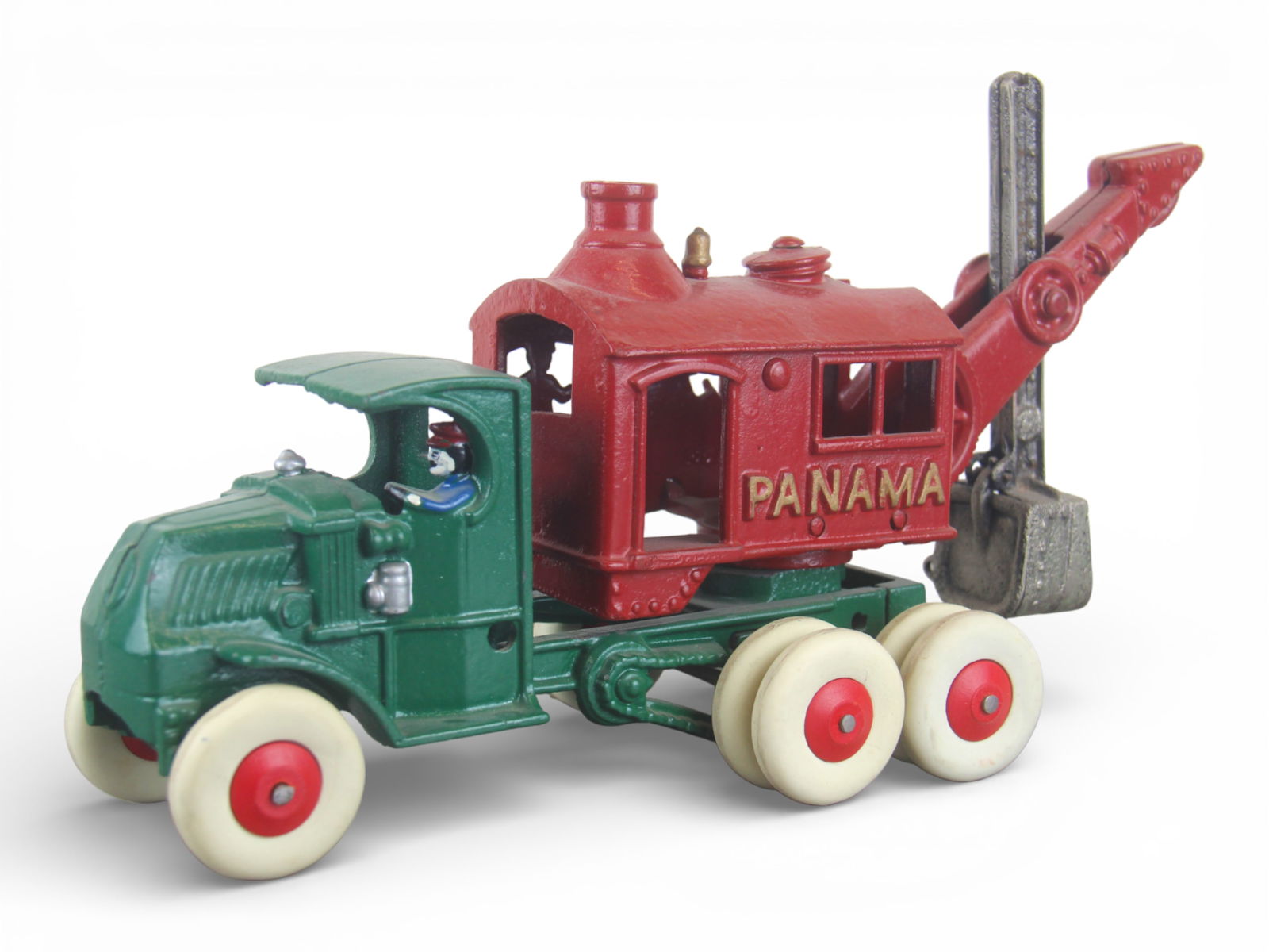 Restored Hubley Panama Mobile Steam Shovel: Painted cast iron with rubber tires over wood hubs, 13 1/2" long. Nicely restored.From the Gary Slutzky Collection of Pressed Steel, Tin, and Cast Iron Vehicles. Shipping: Weiss Auctions offers