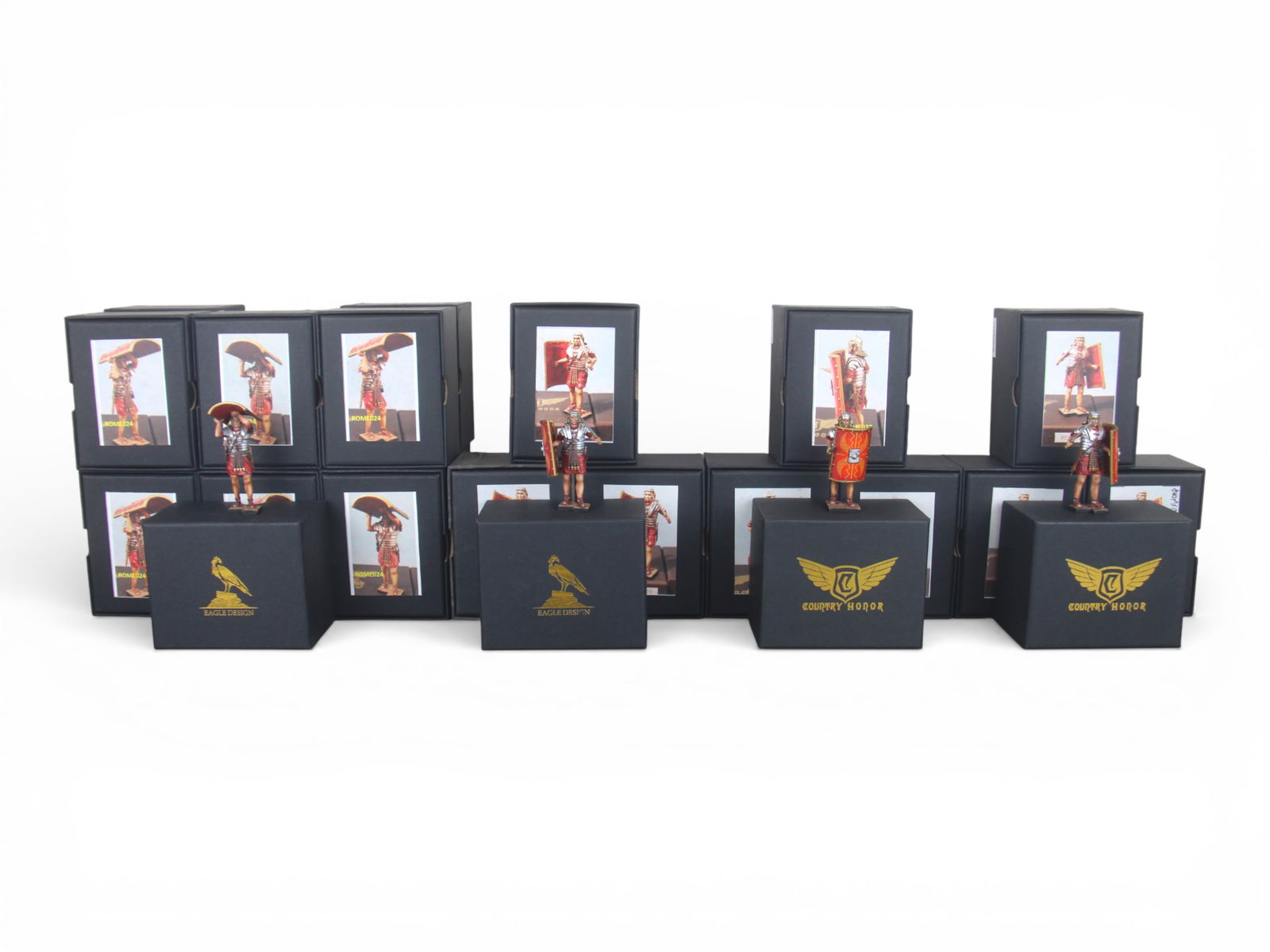 Eagle Design Roman Testudo Boxed Figures: 24 Eagle Designs Boxed Roman Legionnaires for a Testudo formation. Full set of 4 #22, 3 #23, 12 #24, 1 #25, 3 #26, and 1 #27. Excellent detail. Shipping: Weiss Auctions offers full-service, in-house s