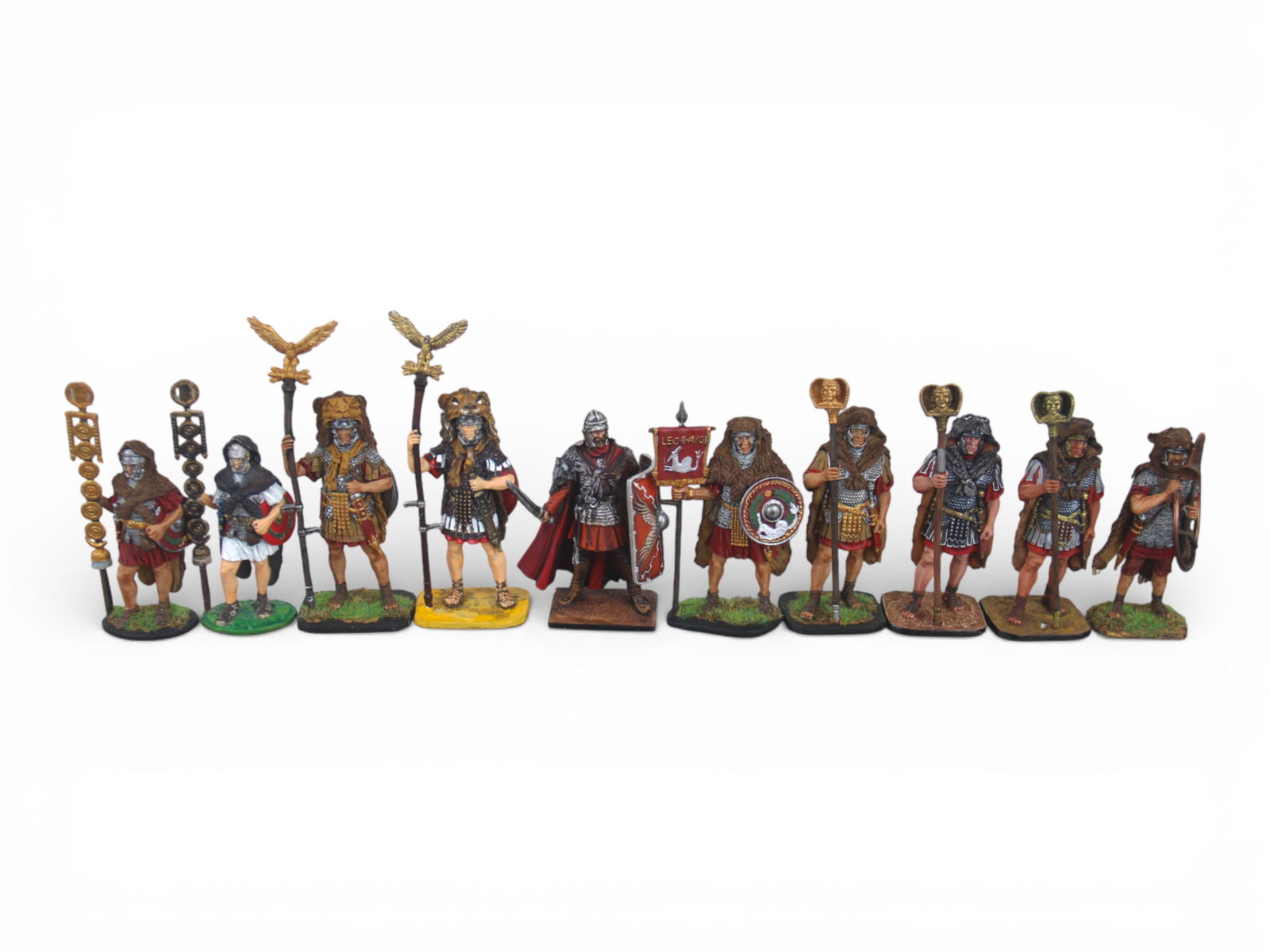 Studio Painted Romans: 10 studio painted, highly detailed Roman Legionnaires, including standard bearers. Includes KC Castings and St. Petersburg. Not artist signed. Shipping: Weiss Auctions offers full-service, in-house sh